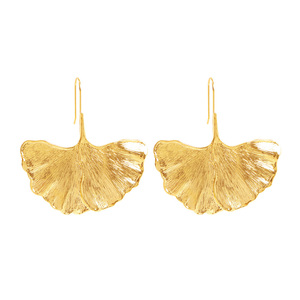 Modern earrings in shape of golden leafs