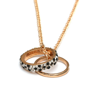 Gold-tone Double rings pendant necklace with black and white rhinestone studded