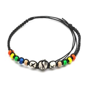 Handmade vibrant wooden beads with black braided adjustable wax cord bracelet 