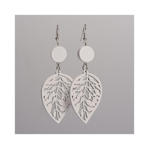 White cut out design leaf wooden drop earrings