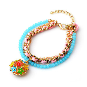 Multi Strand beaded bracelet with flower charm
