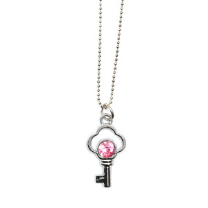 Silver tone key with pink rhinestones pendant necklace