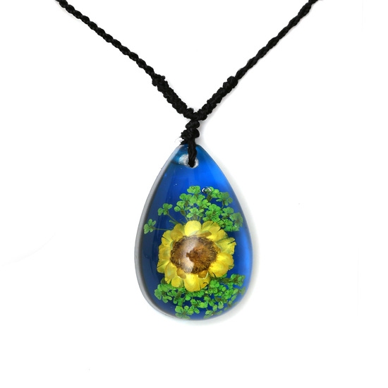 Yellow pressed flower in blue resin teardrop pendant necklace